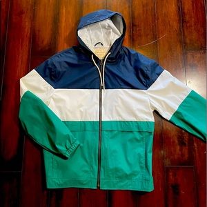 Large white and blue raincoat